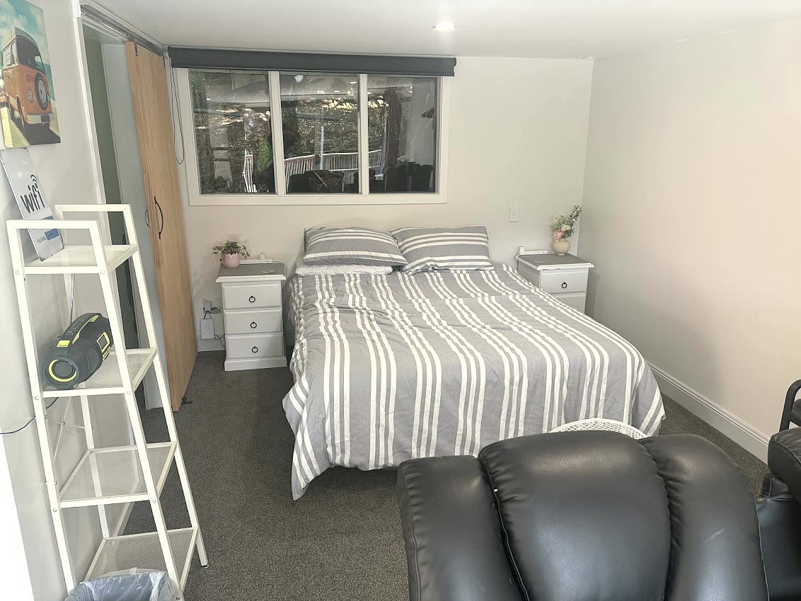 Queen bed and kitchenette